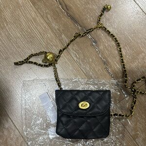 Small black quilted bag